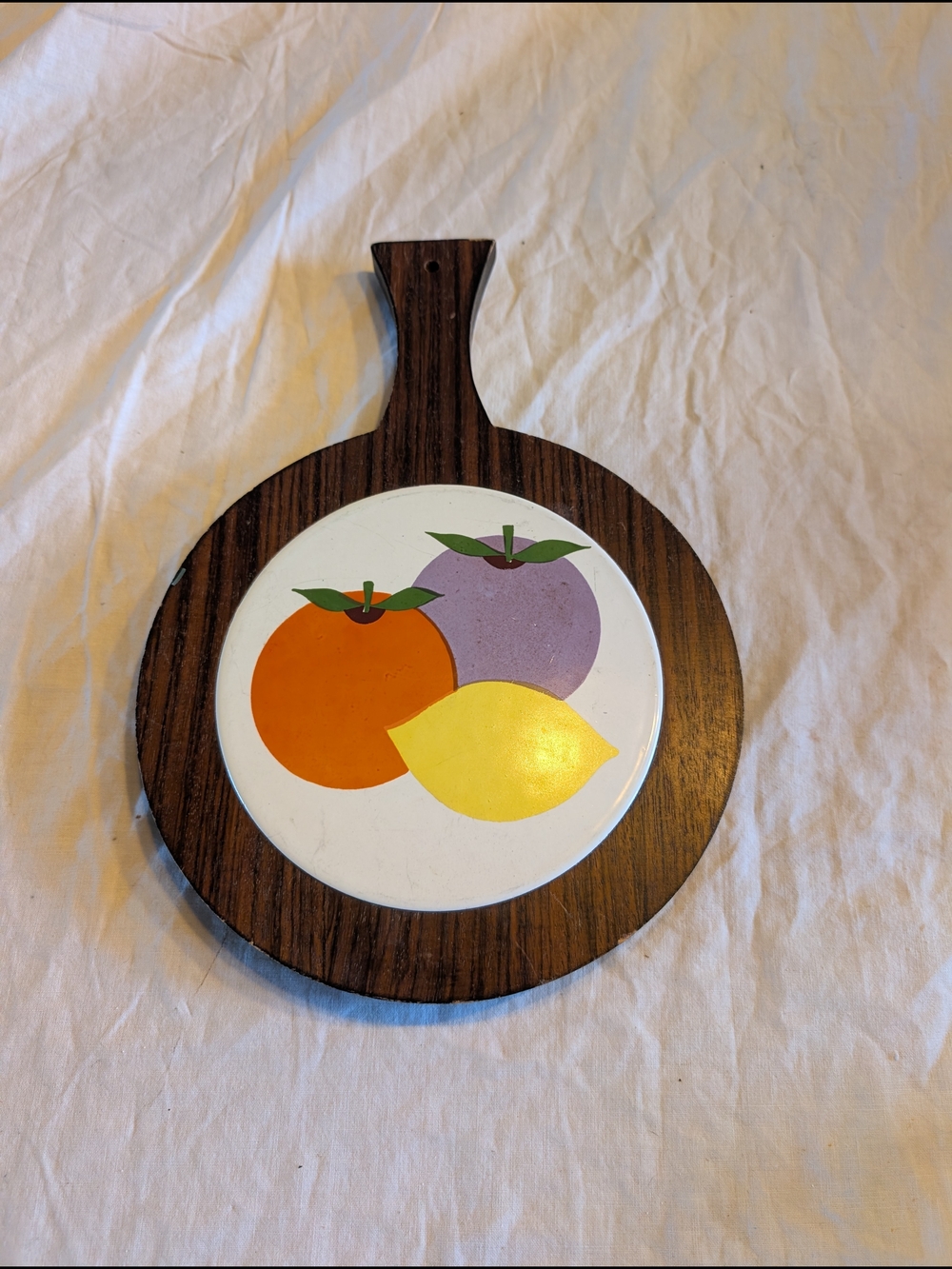 2/40$ Vintage Brown Wood Fruit Trivet with Orange, Yellow and Purple Fruit Motif